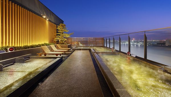 At Villa Fontaine Grand Haneda Airport, a member of WorldHotels Distinctive, guests can soak up the views from the hotel’s private onsen.